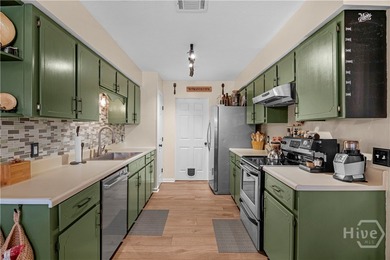 Welcome home to this lovely 4 bedroom, 2 bath ranch with 1,862 on Cherokee Rose Country Club in Georgia - for sale on GolfHomes.com, golf home, golf lot