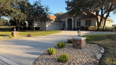 Black Diamond Village home located on the par 3 Diamond Dunes on Black Diamond Ranch Golf Course in Florida - for sale on GolfHomes.com, golf home, golf lot