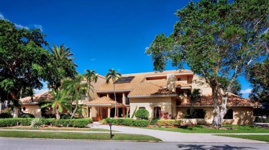 Experience unparalleled elegance in the heart of Boca Grove! on Boca Grove Golf and Tennis in Florida - for sale on GolfHomes.com, golf home, golf lot