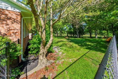 Splendid 3 bedroom, 2.5 bath brick ranch golf course home that on Minnesott Golf and Country Club in North Carolina - for sale on GolfHomes.com, golf home, golf lot