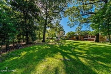 Splendid 3 bedroom, 2.5 bath brick ranch golf course home that on Minnesott Golf and Country Club in North Carolina - for sale on GolfHomes.com, golf home, golf lot