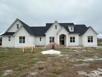 Located in the prestigious Kinderlou Forest Golf Club community on Kinderlou Forest Golf Club in Georgia - for sale on GolfHomes.com, golf home, golf lot