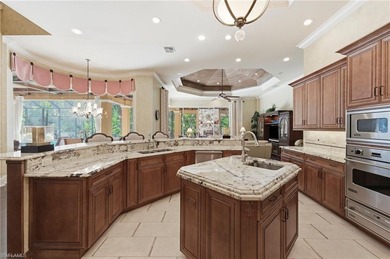 Discover refined living in this custom-built, two-story estate on Naples National Golf Club in Florida - for sale on GolfHomes.com, golf home, golf lot