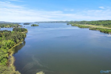 Prime 20-acre waterfront property w/ approx. 2700 feet of main on Gunters Landing in Alabama - for sale on GolfHomes.com, golf home, golf lot