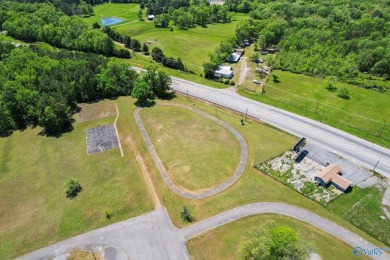 Prime 20-acre waterfront property w/ approx. 2700 feet of main on Gunters Landing in Alabama - for sale on GolfHomes.com, golf home, golf lot