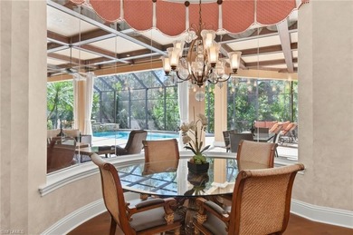 Discover refined living in this custom-built, two-story estate on Naples National Golf Club in Florida - for sale on GolfHomes.com, golf home, golf lot