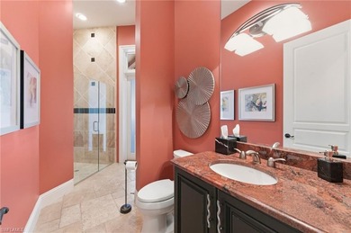 Discover refined living in this custom-built, two-story estate on Naples National Golf Club in Florida - for sale on GolfHomes.com, golf home, golf lot