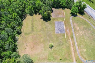 Prime 20-acre waterfront property w/ approx. 2700 feet of main on Gunters Landing in Alabama - for sale on GolfHomes.com, golf home, golf lot