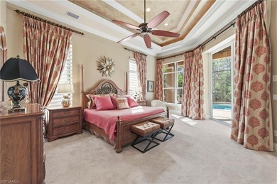 Discover refined living in this custom-built, two-story estate on Naples National Golf Club in Florida - for sale on GolfHomes.com, golf home, golf lot