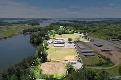 Prime 20-acre waterfront property w/ approx. 2700 feet of main on Gunters Landing in Alabama - for sale on GolfHomes.com, golf home, golf lot