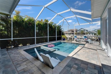 Under contract-accepting backup offers. Easy Breezy Waterfront on Apollo Beach Golf and Sea Club in Florida - for sale on GolfHomes.com, golf home, golf lot