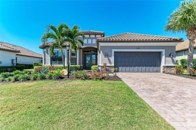 A unique backyard oasis ... in the heart of Esplanade Golf on Esplanade Golf and Country at Lakewood Ranch in Florida - for sale on GolfHomes.com, golf home, golf lot