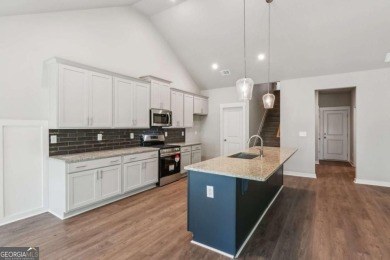 Popular and hard to find Ranch style home on a private homesite on Traditions of Braselton Golf Club in Georgia - for sale on GolfHomes.com, golf home, golf lot