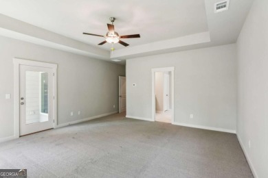 Popular and hard to find Ranch style home on a private homesite on Traditions of Braselton Golf Club in Georgia - for sale on GolfHomes.com, golf home, golf lot