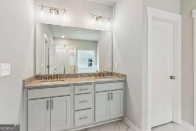 Popular and hard to find Ranch style home on a private homesite on Traditions of Braselton Golf Club in Georgia - for sale on GolfHomes.com, golf home, golf lot