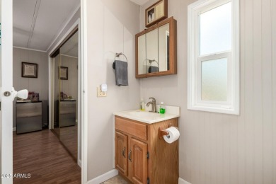 Great   updated  and partially furnished 2 bedroom 2 bath home on Fountain of the Sun Country Club in Arizona - for sale on GolfHomes.com, golf home, golf lot