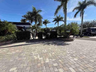 Welcome to this exceptional lakeshore lot boasting expansive on Motorcoach Resort Golf Course in Florida - for sale on GolfHomes.com, golf home, golf lot