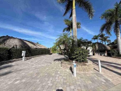 Welcome to this exceptional lakeshore lot boasting expansive on Motorcoach Resort Golf Course in Florida - for sale on GolfHomes.com, golf home, golf lot