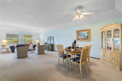 This top-floor condo sits high and dry in a non-flood zone on Bayou Golf Club in Florida - for sale on GolfHomes.com, golf home, golf lot