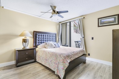 Embrace resort-style living in this inviting 2BR/2BA patio home on PGA National Golf Club in Florida - for sale on GolfHomes.com, golf home, golf lot