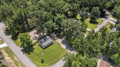 LOCATION!! LOCATION!! Lots of Potential for This Level Camp Lot on River Golf and County Club at Lake Royale in North Carolina - for sale on GolfHomes.com, golf home, golf lot