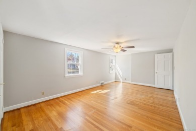 Nestled in a peaceful neighborhood, this beautiful 4-bedroom on Rockledge Golf Club in Connecticut - for sale on GolfHomes.com, golf home, golf lot