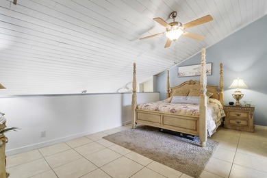 Embrace resort-style living in this inviting 2BR/2BA patio home on PGA National Golf Club in Florida - for sale on GolfHomes.com, golf home, golf lot