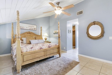 Embrace resort-style living in this inviting 2BR/2BA patio home on PGA National Golf Club in Florida - for sale on GolfHomes.com, golf home, golf lot