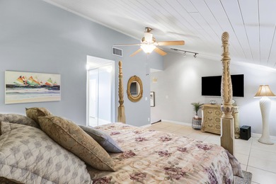 Embrace resort-style living in this inviting 2BR/2BA patio home on PGA National Golf Club in Florida - for sale on GolfHomes.com, golf home, golf lot