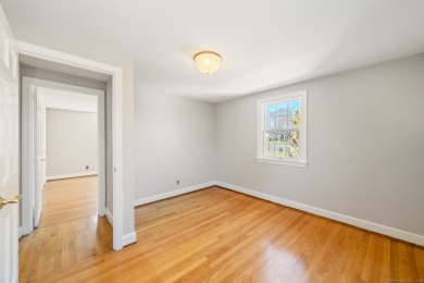 Nestled in a peaceful neighborhood, this beautiful 4-bedroom on Rockledge Golf Club in Connecticut - for sale on GolfHomes.com, golf home, golf lot