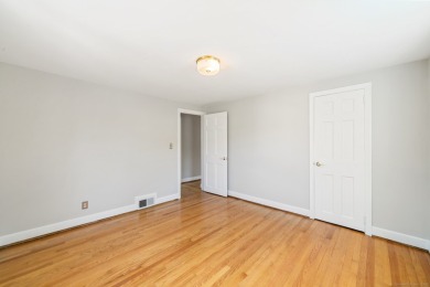 Nestled in a peaceful neighborhood, this beautiful 4-bedroom on Rockledge Golf Club in Connecticut - for sale on GolfHomes.com, golf home, golf lot