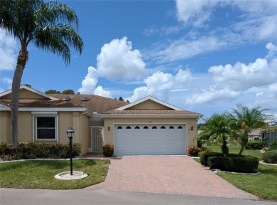 Under contract-accepting backup offers. Modern Comfort with on Falcon Watch Golf Club in Florida - for sale on GolfHomes.com, golf home, golf lot