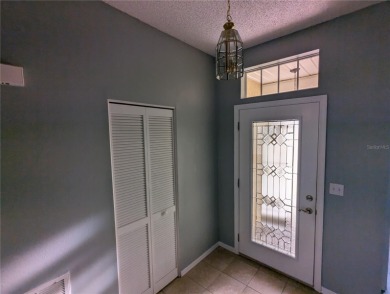 Under contract-accepting backup offers. Modern Comfort with on Falcon Watch Golf Club in Florida - for sale on GolfHomes.com, golf home, golf lot