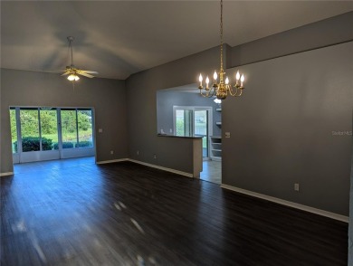 Under contract-accepting backup offers. Modern Comfort with on Falcon Watch Golf Club in Florida - for sale on GolfHomes.com, golf home, golf lot