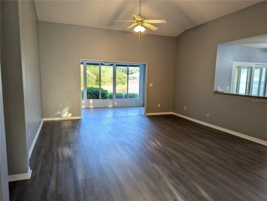 Under contract-accepting backup offers. Modern Comfort with on Falcon Watch Golf Club in Florida - for sale on GolfHomes.com, golf home, golf lot