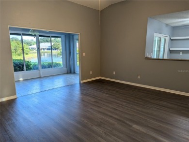 Under contract-accepting backup offers. Modern Comfort with on Falcon Watch Golf Club in Florida - for sale on GolfHomes.com, golf home, golf lot