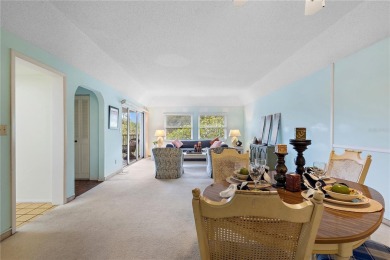 This top-floor condo sits high and dry in a non-flood zone on Bayou Golf Club in Florida - for sale on GolfHomes.com, golf home, golf lot