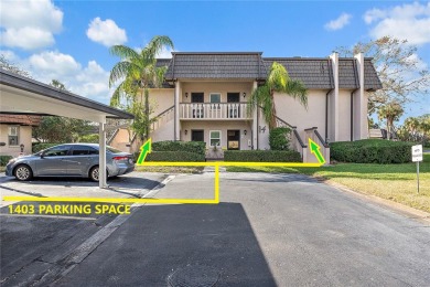 This top-floor condo sits high and dry in a non-flood zone on Bayou Golf Club in Florida - for sale on GolfHomes.com, golf home, golf lot