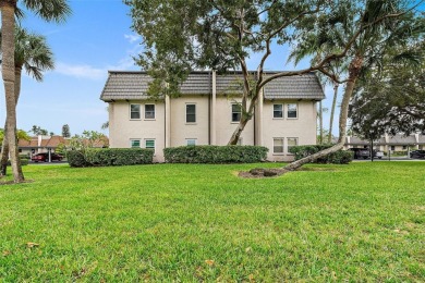 This top-floor condo sits high and dry in a non-flood zone on Bayou Golf Club in Florida - for sale on GolfHomes.com, golf home, golf lot