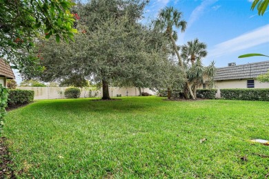 This top-floor condo sits high and dry in a non-flood zone on Bayou Golf Club in Florida - for sale on GolfHomes.com, golf home, golf lot