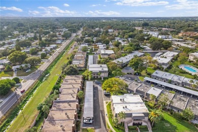 This top-floor condo sits high and dry in a non-flood zone on Bayou Golf Club in Florida - for sale on GolfHomes.com, golf home, golf lot