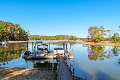 Waterfront home with a boat dock with a jetski dock on a deep on Monticello Golf Club At Savannah Lakes in South Carolina - for sale on GolfHomes.com, golf home, golf lot