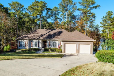 Waterfront home with a boat dock with a jetski dock on a deep on Monticello Golf Club At Savannah Lakes in South Carolina - for sale on GolfHomes.com, golf home, golf lot