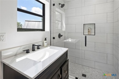 This stunning property offers a perfect blend of tranquility and on Slick Rock Golf Course - Horseshoe Bay in Texas - for sale on GolfHomes.com, golf home, golf lot