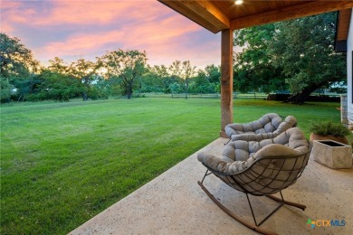 This stunning property offers a perfect blend of tranquility and on Slick Rock Golf Course - Horseshoe Bay in Texas - for sale on GolfHomes.com, golf home, golf lot