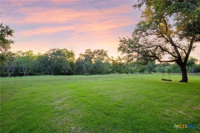 This stunning property offers a perfect blend of tranquility and on Slick Rock Golf Course - Horseshoe Bay in Texas - for sale on GolfHomes.com, golf home, golf lot