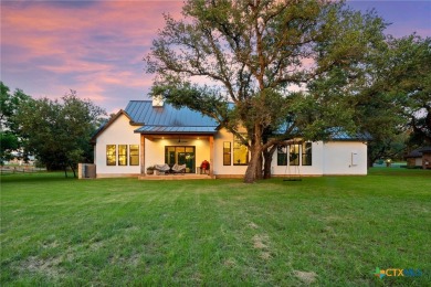 This stunning property offers a perfect blend of tranquility and on Slick Rock Golf Course - Horseshoe Bay in Texas - for sale on GolfHomes.com, golf home, golf lot
