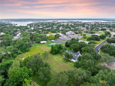 This stunning property offers a perfect blend of tranquility and on Slick Rock Golf Course - Horseshoe Bay in Texas - for sale on GolfHomes.com, golf home, golf lot