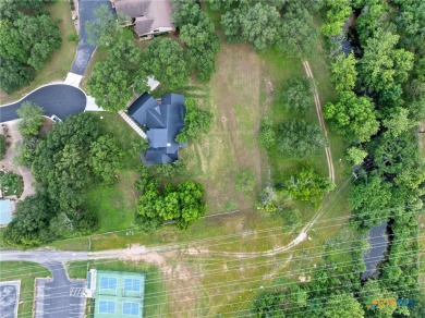 This stunning property offers a perfect blend of tranquility and on Slick Rock Golf Course - Horseshoe Bay in Texas - for sale on GolfHomes.com, golf home, golf lot
