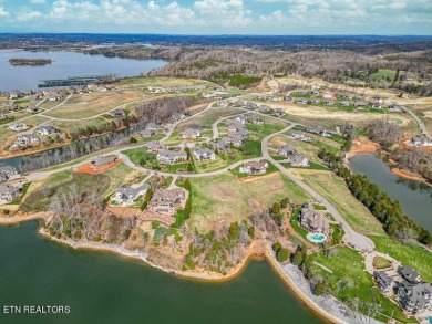 Exquisite lakefront property situated on the captivating main on Wind River Golf Course in Tennessee - for sale on GolfHomes.com, golf home, golf lot
